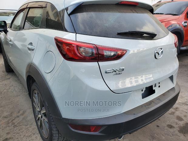 Beige Mazda CX-3 2016 - Affordable, High-Quality Compact SUV