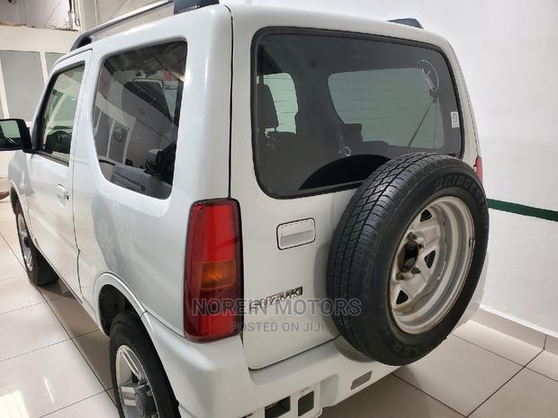 2015 Suzuki Jimny White: Compact, Powerful, and Ready for Your Adventure