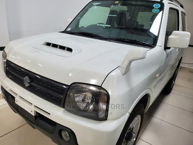 2015 Suzuki Jimny White: Compact, Powerful, and Ready for Your Adventure
