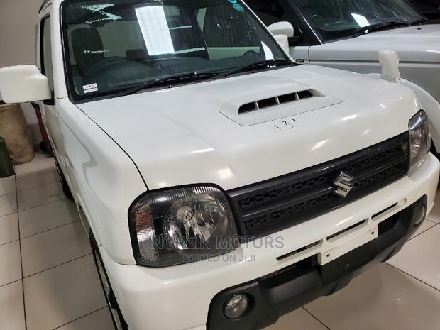 2015 Suzuki Jimny White: Compact, Powerful, and Ready for Your Adventure