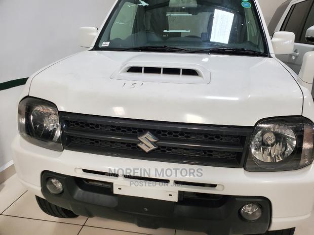 2015 Suzuki Jimny White: Compact, Powerful, and Ready for Your Adventure