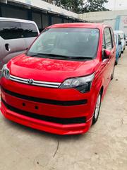 Toyota Spade 2015 in Red: Luxury and Practicality at Your Fingertips! for sale