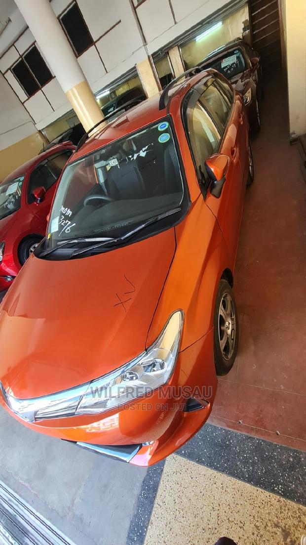 2015 Toyota Corolla Fielder in Orange: Affordable, Stylish, and Reliable