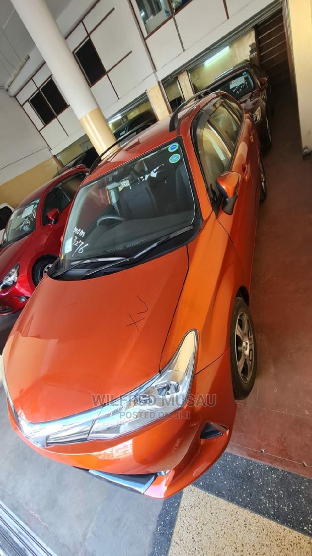 2015 Toyota Corolla Fielder in Orange: Affordable, Stylish, and Reliable