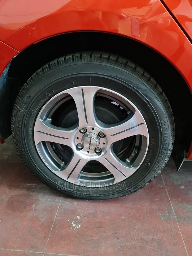 2015 Toyota Corolla Fielder in Orange: Affordable, Stylish, and Reliable