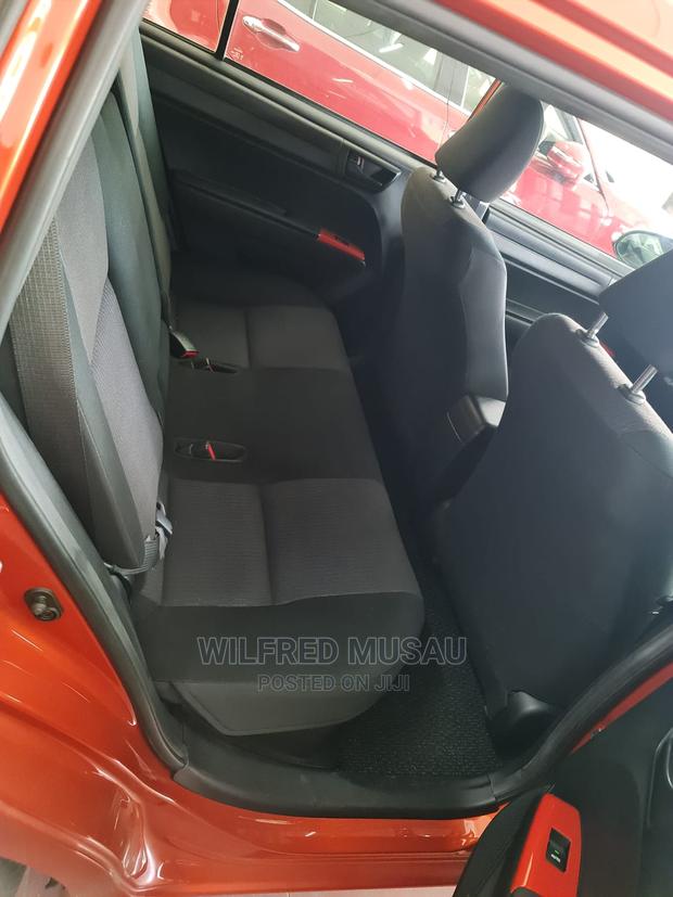2015 Toyota Corolla Fielder in Orange: Affordable, Stylish, and Reliable