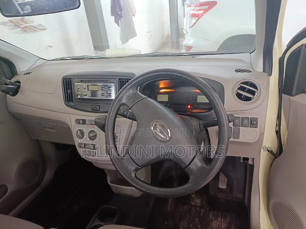 Yellow Daihatsu Mira 2016 - Compact Car for Sale