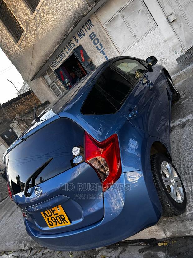Blue Nissan Note 2015: Affordable & Efficient Compact Car