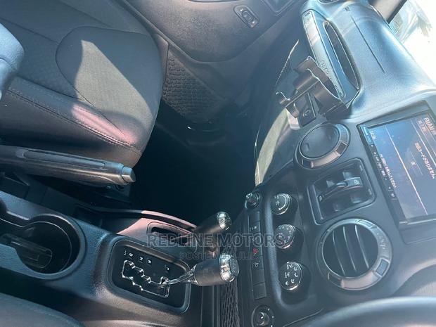 Black 2016 Jeep Wrangler - Pre-owned Off-road Vehicle