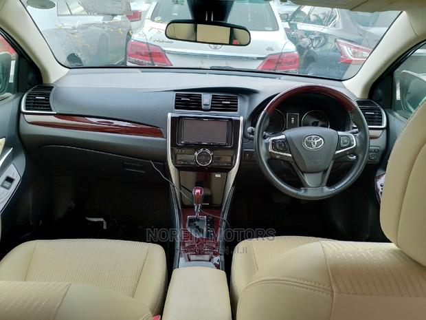 2015 Toyota Premio AWD Black: Stylish and Reliable Pre-owned Sedan