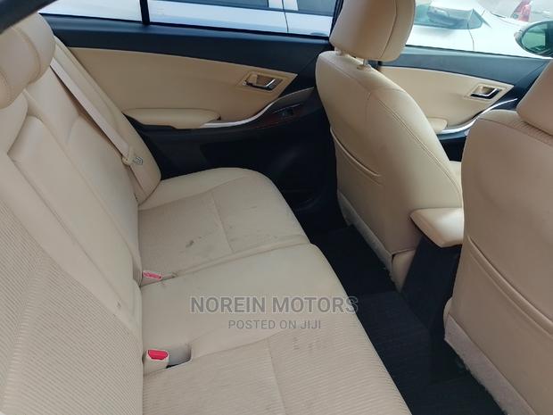 2015 Toyota Premio AWD Black: Stylish and Reliable Pre-owned Sedan
