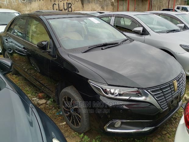 2015 Toyota Premio AWD Black: Stylish and Reliable Pre-owned Sedan