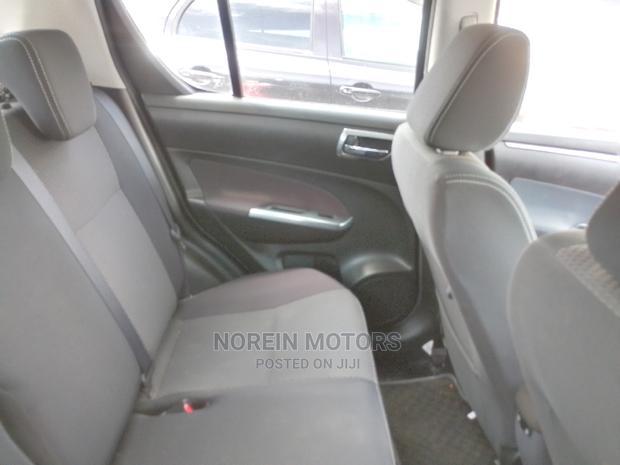 2016 Black Suzuki Swift - Affordable Luxury and Efficiency