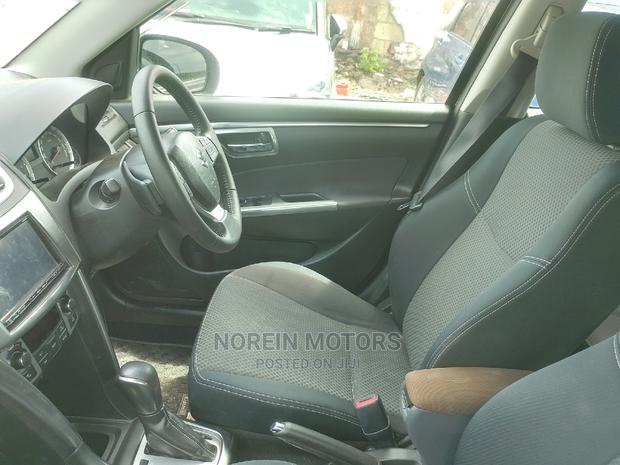 2016 Black Suzuki Swift - Affordable Luxury and Efficiency