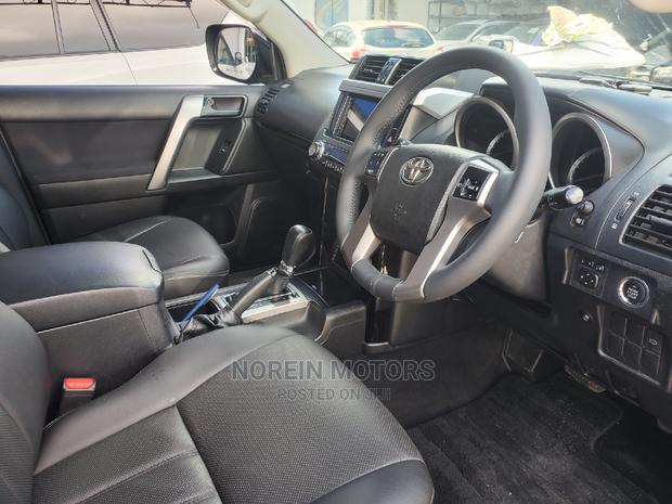 Pre-Owned 2014 Toyota Land Cruiser Prado Black: Luxury and Reliability on Your Terms