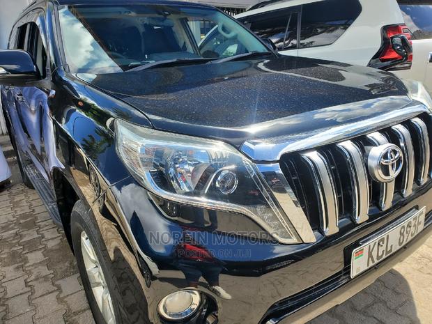 Pre-Owned 2014 Toyota Land Cruiser Prado Black: Luxury and Reliability on Your Terms