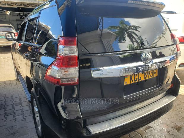 Pre-Owned 2014 Toyota Land Cruiser Prado Black: Luxury and Reliability on Your Terms