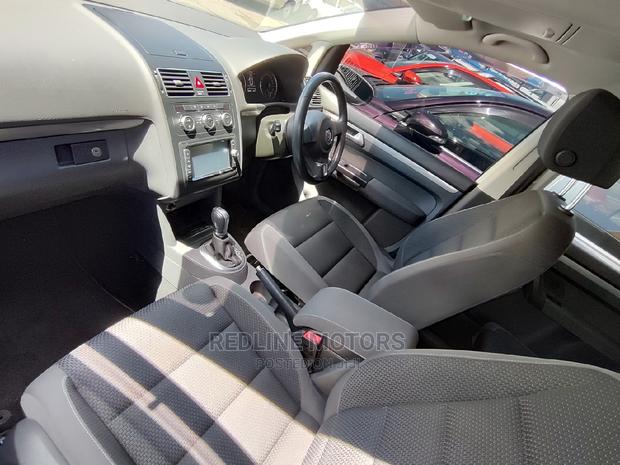 2016 White Touran Volkswagen - Modern and Versatile MPV