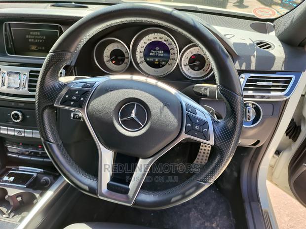 2016 Mercedes-Benz E250 White: Sleek Sedan with Power and Elegance