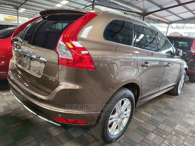Brown Volvo XC60 T6 Drive-E AWD 2016