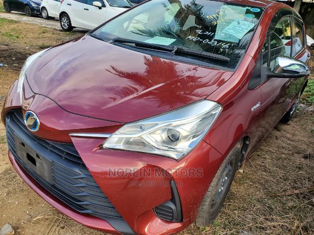 Red 2016 Toyota Vitz: Compact Sedan with Style