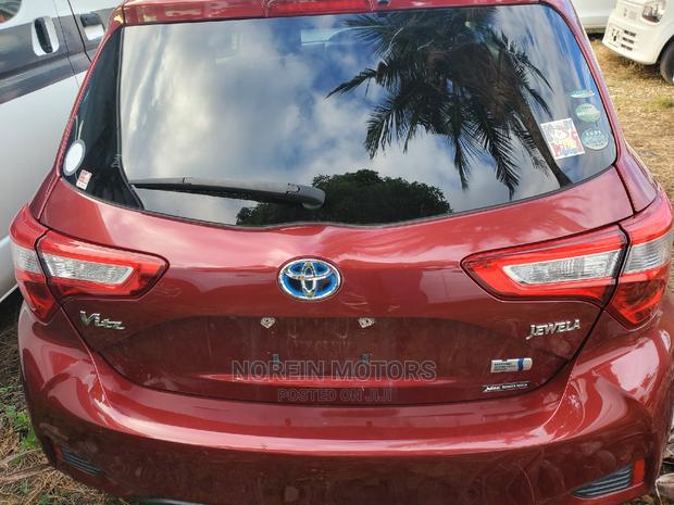 Red 2016 Toyota Vitz: Compact Sedan with Style