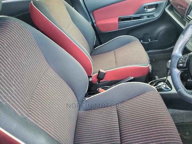 Red 2016 Toyota Vitz: Compact Sedan with Style