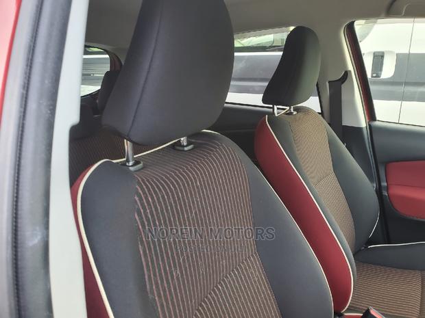 Red 2016 Toyota Vitz: Compact Sedan with Style