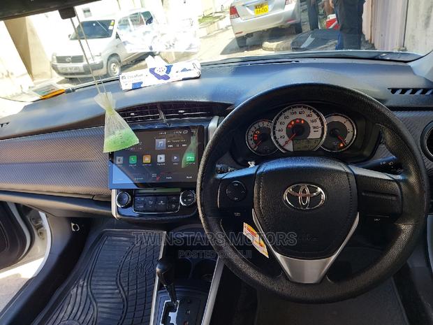 White 2015 Toyota Corolla Fielder - Elegance and Practicality