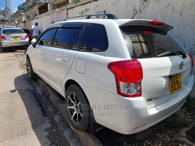 White 2015 Toyota Corolla Fielder - Elegance and Practicality