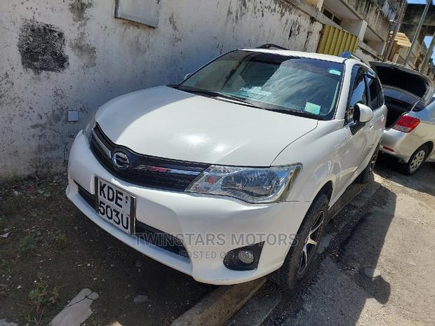 White 2015 Toyota Corolla Fielder - Elegance and Practicality