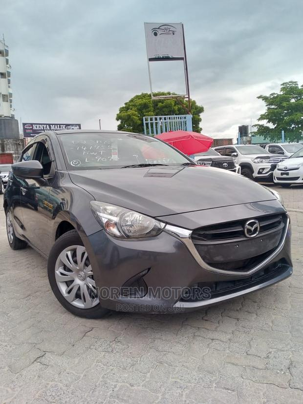Pink Mazda Demio 2016 - Compact Hatchback that Stands Out