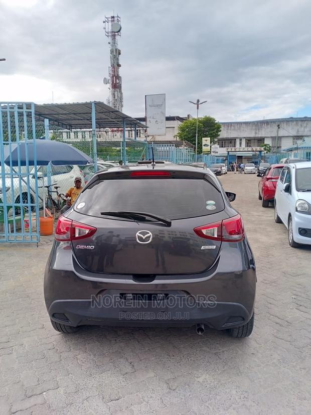 Pink Mazda Demio 2016 - Compact Hatchback that Stands Out