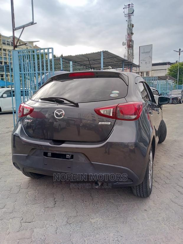 Pink Mazda Demio 2016 - Compact Hatchback that Stands Out