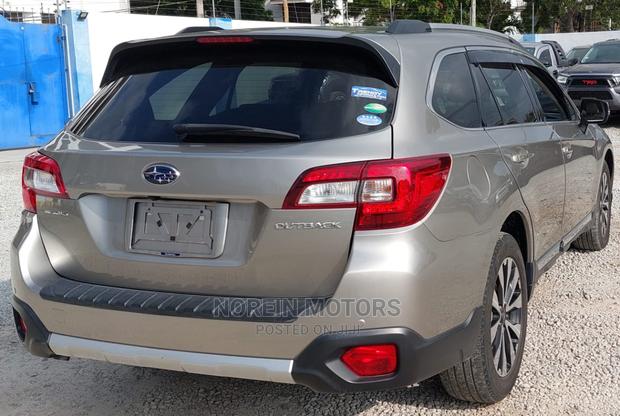 2016 Subaru Outback in Gold: Pre-Owned SUV Elegance