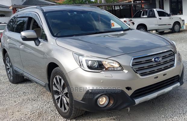 2016 Subaru Outback in Gold: Pre-Owned SUV Elegance