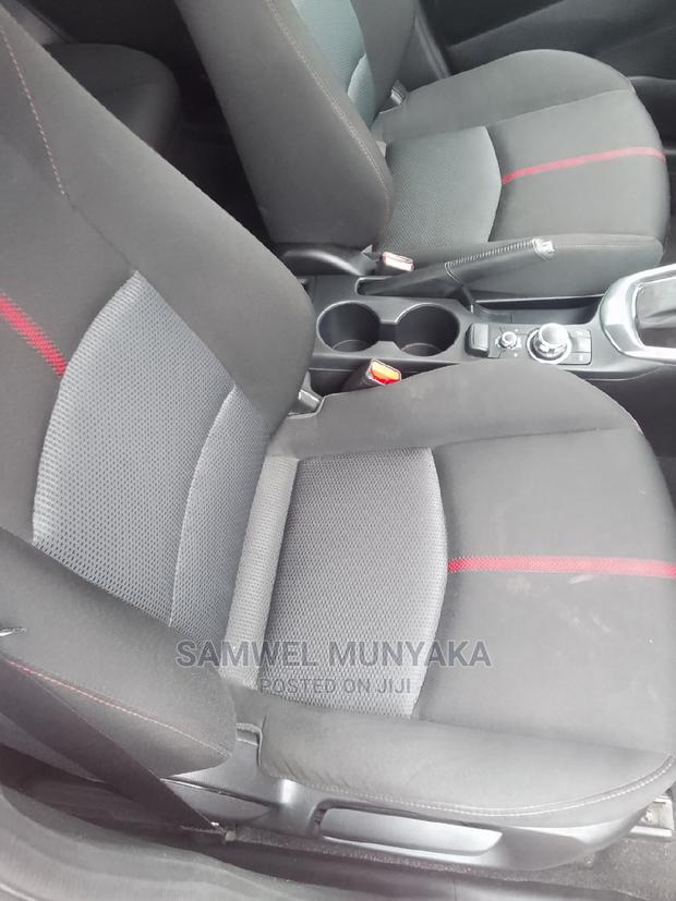 2016 Red Mazda Demio - Pre-Owned Sedan Offering a Great Driving Experience
