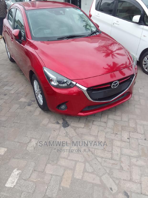 2016 Red Mazda Demio - Pre-Owned Sedan Offering a Great Driving Experience
