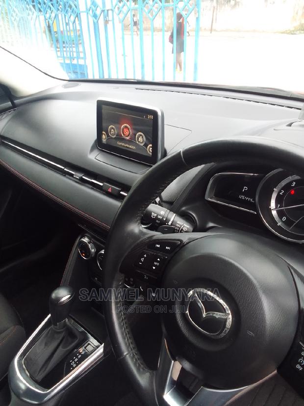 2016 Red Mazda Demio - Pre-Owned Sedan Offering a Great Driving Experience