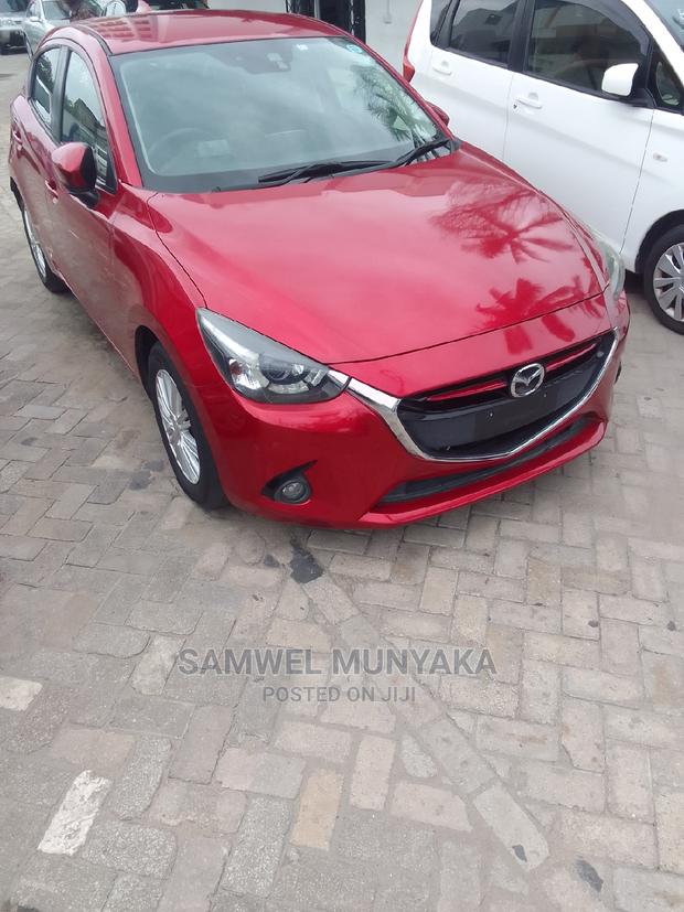 2016 Red Mazda Demio - Pre-Owned Sedan Offering a Great Driving Experience
