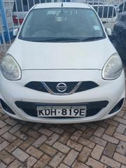 White 2015 Nissan March - Reliable and Attractive Compact Vehicle for sale