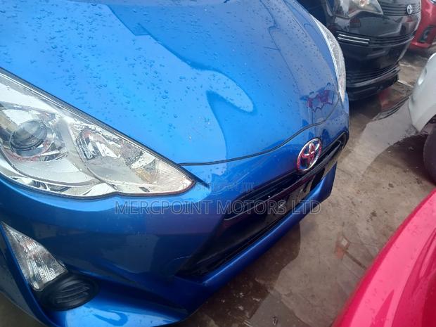 2016 Toyota Aqua Blue - A Hybrid Sedan for Eco-conscious Drivers