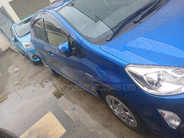 2016 Toyota Aqua Blue - A Hybrid Sedan for Eco-conscious Drivers