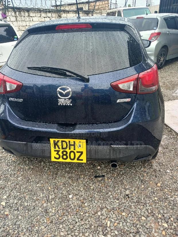 Efficient 2015 Mazda Demio Blue: Compact Car with a Sporty Edge