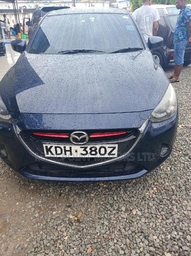 Efficient 2015 Mazda Demio Blue: Compact Car with a Sporty Edge