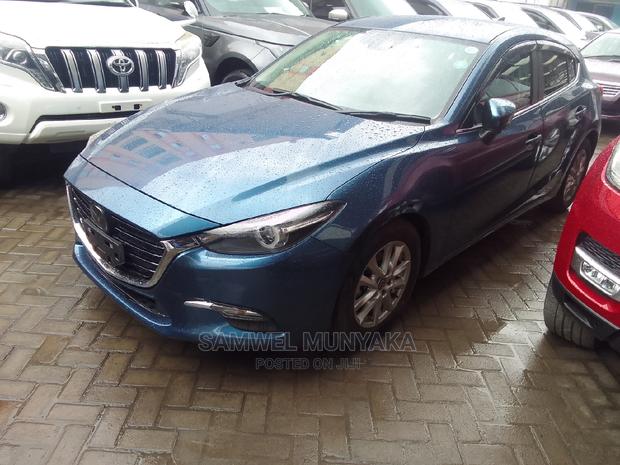 Mazda Axela 2016 in Blue: Compact Sedan with Style