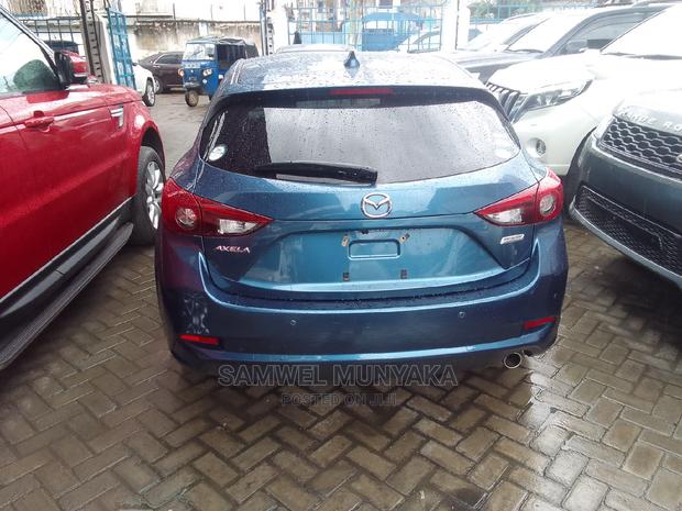 Mazda Axela 2016 in Blue: Compact Sedan with Style
