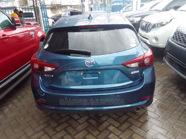 Mazda Axela 2016 in Blue: Compact Sedan with Style