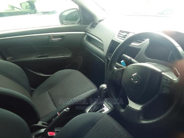 2016 Suzuki Swift Gray: Stylish Compact Car for Sale