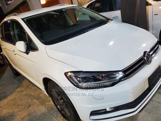 White Volkswagen Touran 2016 - Comfortable 7-Seater
